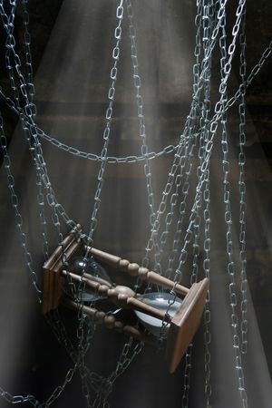 The hours held down by a chain have stopped timeの写真素材