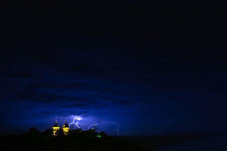 LIghtning stike over the chapel during the stormの写真素材