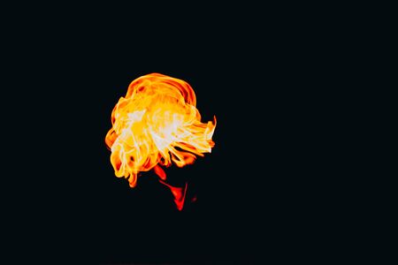 Flames of fire on dark background. Burningの写真素材