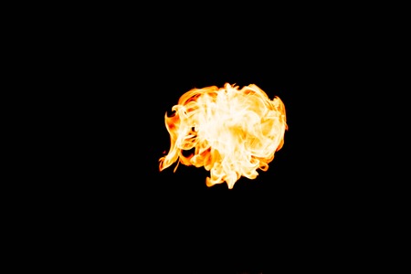 Flames of fire on dark background. Burning