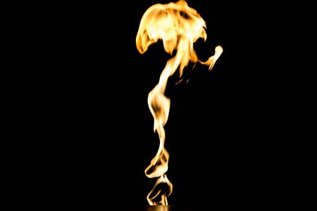 Flames of fire on dark background. Burningの写真素材