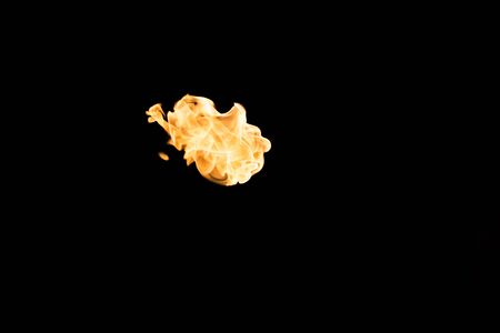 Flames of fire on dark background. Burningの写真素材