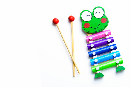 Colourful child's glockenspiel with two wooden mallets, playingの写真素材
