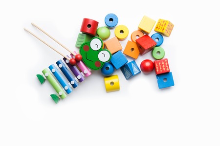 Toys blocks, multicolor wooden building bricks, heap of colorful game piecesの写真素材