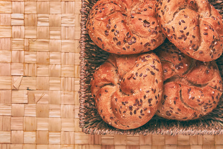 Breakfast server. Cooked buns on the table.の写真素材