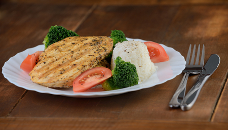 grilled chicken breast with rice and vegetablesの写真素材