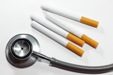 cigarette and stethoscopeの写真素材