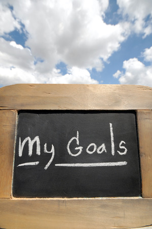 my goals on vintage slate blackboard with sky の写真素材