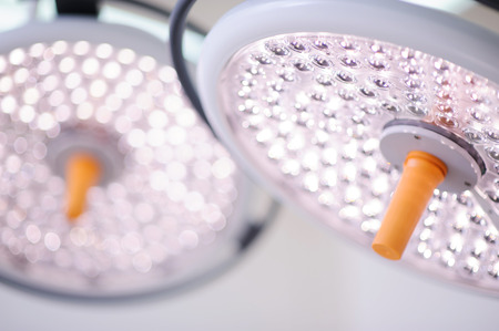 Two surgical lamps in operation room.の写真素材