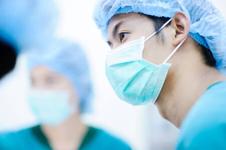 veterinarian surgeons in operation roomの写真素材