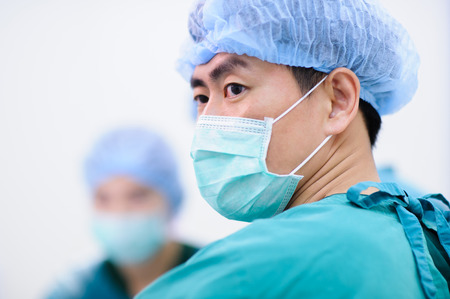 group of veterinarian surgery in operation room