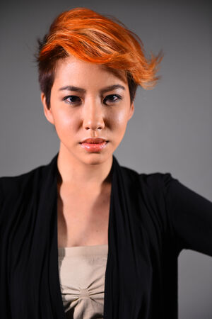 portrait of a beautiful girl with dyed hair, professional hair coloringの写真素材