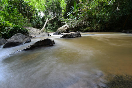 Waterfall in green forest in Thailandの写真素材