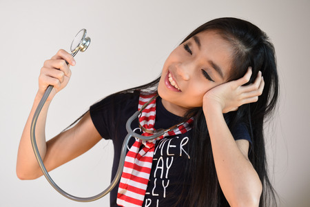 Little girl with stethoscopeの写真素材