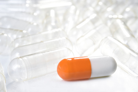 Capsules pill on white background.の写真素材