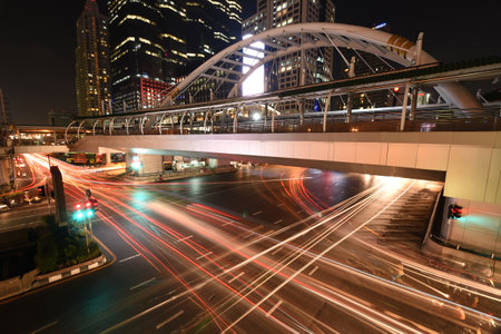Bangkok,Thailand - February 25,2015 :The traffic at night on Sathon road, the business centre in Bangkok,Thailand.のeditorial素材
