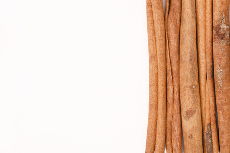 Cinnamon sticks isolated on white backgroundの写真素材