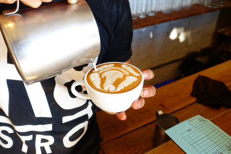 a cup of latte art coffee.の写真素材