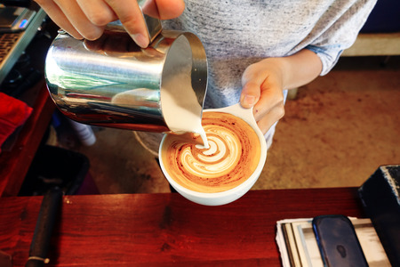 a cup of latte art coffee.の写真素材