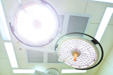 Two surgical lamps in operation roomの写真素材
