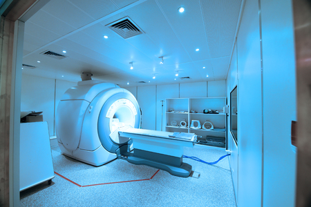 CT scanner room in hospital take with art lighting and blue filterの写真素材