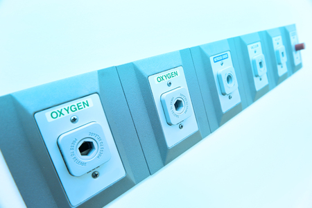 oxygen outlet in operating room take with art lighting and blue filterの写真素材