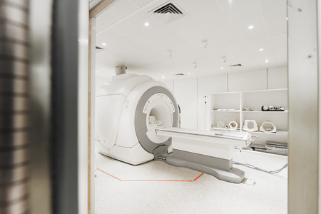 MRI scanner room in hospital take with selective color technique and art lightingの写真素材