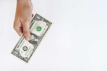 Dollars bill on hand isolated on white backgroundの写真素材