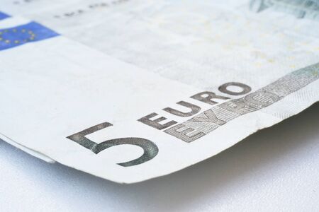 Five euro isolated on white backgroundの写真素材