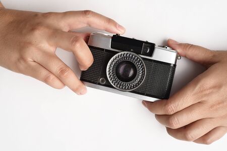 vintage camera on handの写真素材