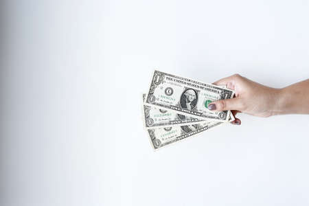 Dollars bill on hand isolated on white background
