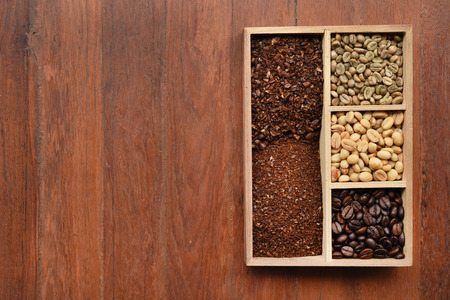 different coffee forms in wooden boxの写真素材