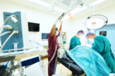 Blur of group of veterinarian surgery in operation roomの写真素材