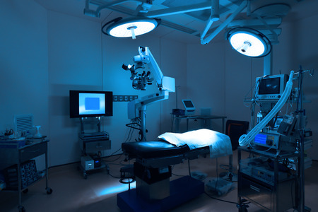 equipment and medical devices in modern operating room take with art lighting and blue filterの写真素材