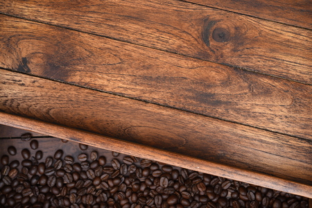 close up of coffee beans on wooden backgroundの写真素材