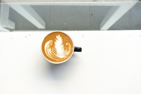 cup of latte art coffee for backgroundの写真素材