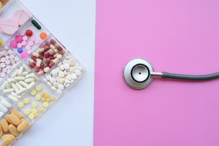 Different medication with stethoscope for backgroundの写真素材