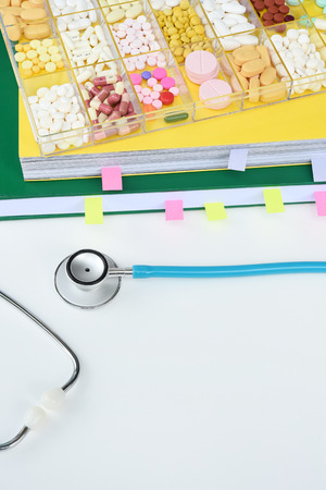 Different medication with stethoscope for backgroundの写真素材