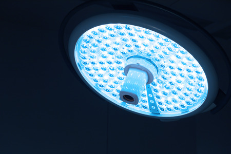 surgical lamps in operation room take with art lighting and blue filterの写真素材