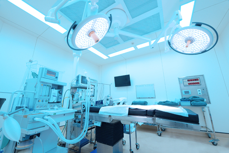 Equipment and medical devices in modern operating room take with art lighting and blue filterの写真素材