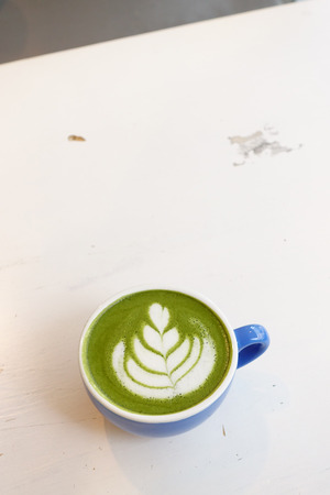 A cup of green tea matcha latte for backgroundの写真素材