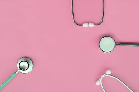close up of stethoscope on pink  backgroundの写真素材