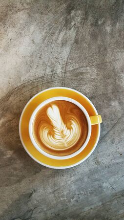 a cup of latte art coffee for background