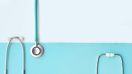 close up of stethoscope on white and blue backgroundの写真素材