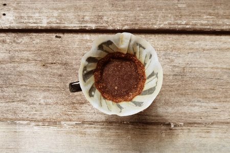 close up of a cup of coffee on wooden backgroundの写真素材