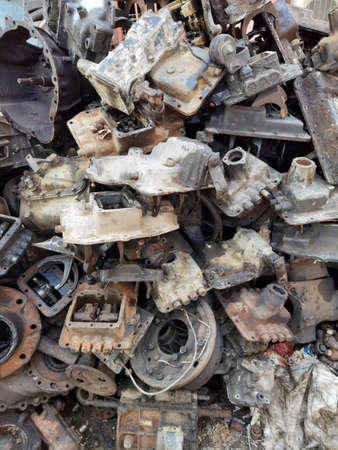 The recycle garage sale about old car wheel axles and parts of carの写真素材