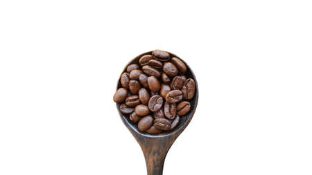 Coffee beans in a wooden spoon isolated on white backgroundの写真素材