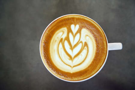 a cup of latte art coffee for backgroundの写真素材