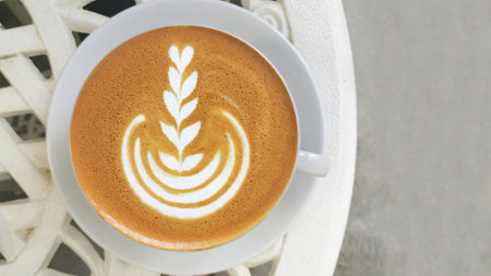 a cup of latte art coffee for background