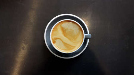 a cup of latte art coffee for backgroundの写真素材
